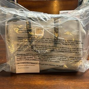 NWT - black 4 pc travel set by DSW